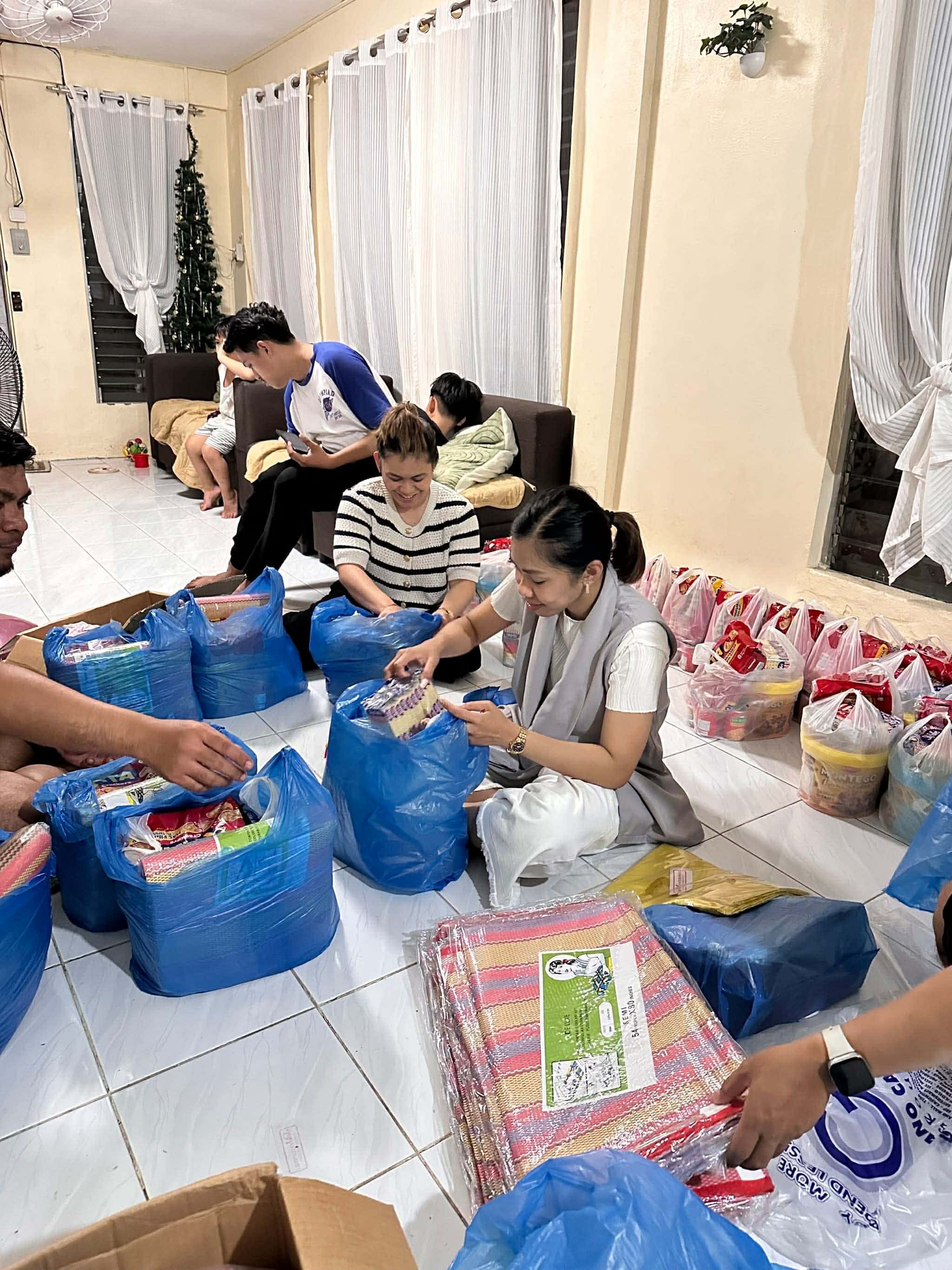 Church volunteers in community prayer